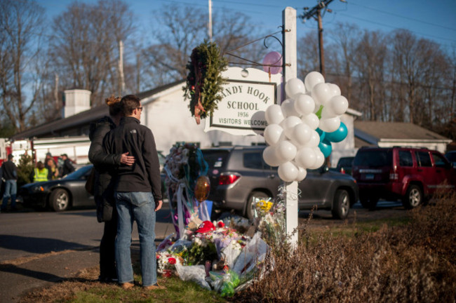 newtown-ct-usa-15th-dec-2012-people-gather-at-a-memorial-site-near-the-sandy-hook-elementary-school-in-newtown-ct-saturday-afternoon-to-remember-the-victims-of-the-school-shooting-in-newtown-c