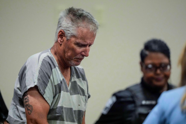 colin-gray-54-the-father-of-apalachee-high-school-shooter-colt-gray-14-enters-the-barrow-county-courthouse-for-his-first-appearance-on-friday-sept-6-2024-in-winder-ga-ap-photobrynn-anders