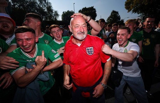 an-england-fan-with-irish-fans-ahead-of-the-game