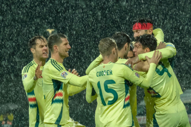 wales-kieffer-moore-celebrates-with-teammates-after-scoring-his-sides-opening-goal-during-the-uefa-nations-league-soccer-match-between-montenegro-and-wales-at-the-city-stadium-in-niksic-montenegro