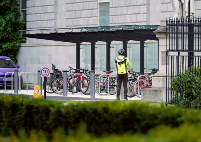 a-cyclist-uses-a-bike-shelter-at-leinster-house-dublin-which-cost-336000-euro-to-install-the-office-of-public-works-opw-has-said-the-bike-shelter-is-within-the-grounds-of-leinster-house-and-tha