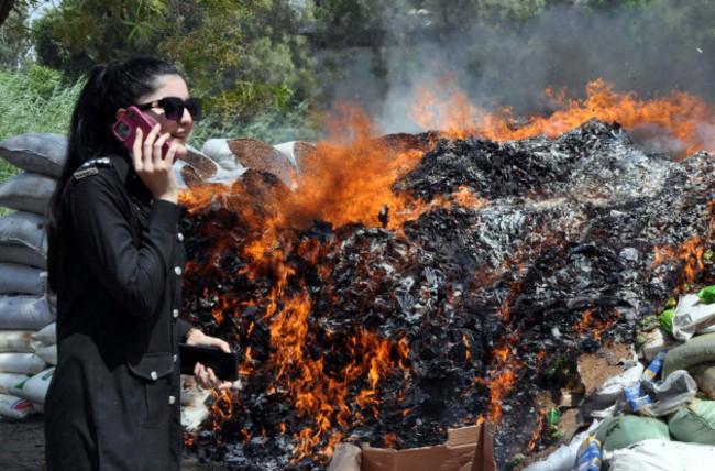 view-of-burning-pile-of-confiscated-drugs-cigarettes-and-others-goods-which-were-seized-from-different-areas-during-drug-destruction-ceremony-organized-by-customs-in-hyderabad-on-thursday-september