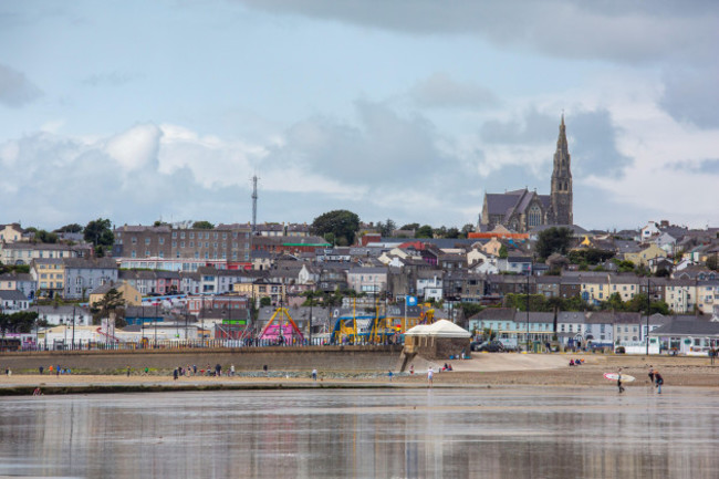 a-view-of-the-seaside-town-of-tramore-in-ireland-taken-from-the-beach-on-a-summers-day