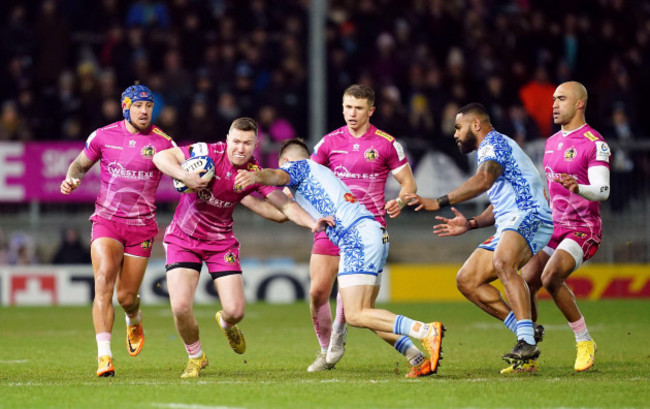 exeter-chiefs-rory-oloughlin-is-tackled-by-castres-thomas-larregain-during-the-heineken-champions-cup-match-at-sandy-park-exeter-picture-date-saturday-january-21-2023