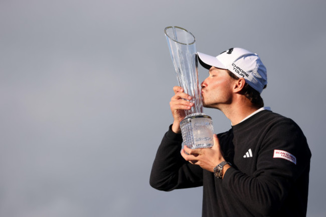 denmarks-rasmus-hojgaard-kisses-the-trophy-after-winning-the-amgen-irish-open-2024-at-royal-county-down-in-newcastle-county-down-picture-date-sunday-september-15-2024