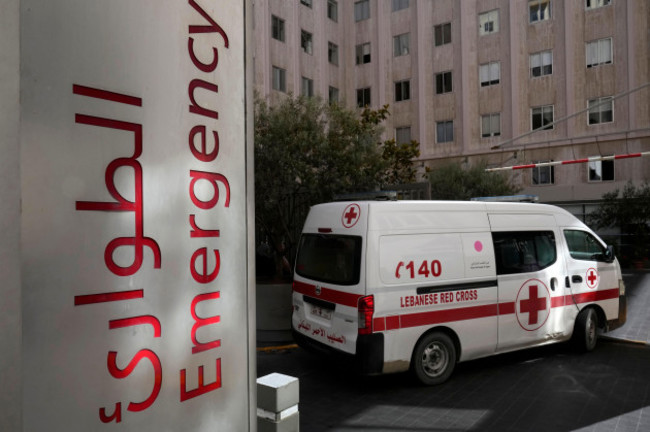 corrects-day-to-tuesday-when-injured-a-lebanese-red-cross-ambulance-enters-the-emergency-building-of-the-american-university-hospital-were-some-of-the-victims-who-were-wounded-on-tuesday-by-their-e