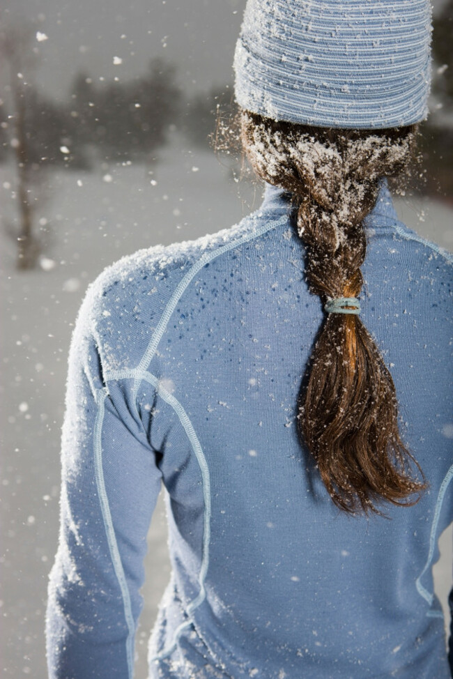 rear-view-of-woman-in-winter-summit-county-near-frisco-colorado-usa