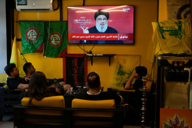 people-watch-the-speech-of-hezbollah-leader-hassan-nasrallah-as-they-sit-in-a-cafe-in-the-southern-suburbs-of-beirut-thursday-sept-19-2024-ap-photohassan-ammar