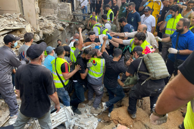 rescuers-carry-a-body-at-the-scene-of-a-missile-strike-in-the-southern-suburbs-of-beirut-friday-sept-20-2024-ap-photobilal-hussein