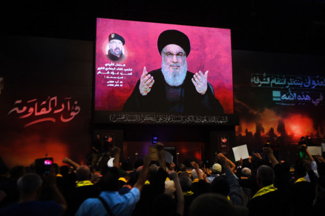 cairo-lebanon-6th-aug-2024-hezbollah-supporters-listen-to-a-televised-speech-given-by-hezbollah-leader-sayyed-hassan-nasrallah-during-an-event-commemorating-late-military-commander-fouad-shokor-in