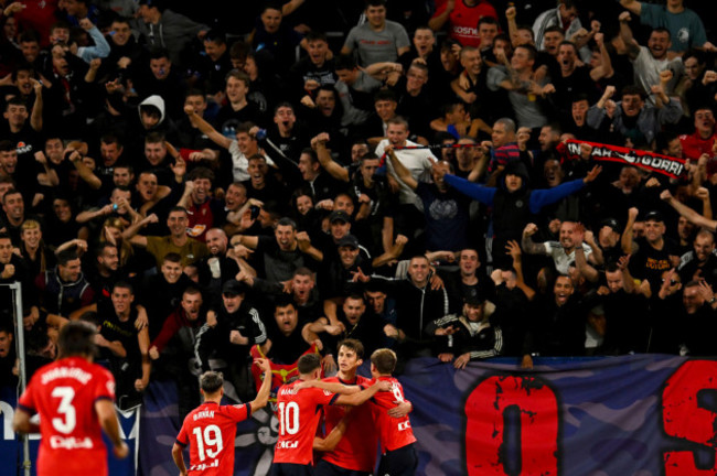 osasunas-ante-budimir-celebrates-his-sides-third-goal-from-a-penalty-kick-during-a-spanish-la-liga-soccer-match-between-osasuna-and-barcelona-at-el-sadar-stadium-in-pamplona-spain-saturday-sept