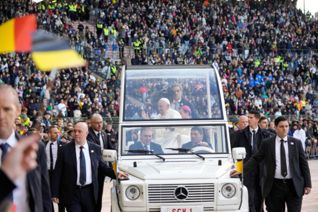 pope-francis-is-cheered-by-faithful-as-he-arrives-to-preside-over-the-sunday-mass-in-king-baudouin-stadium-in-brussels-sunday-sept-29-2024-ap-photoandrew-medichini