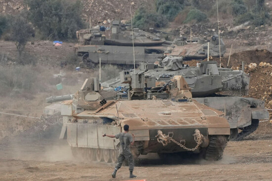 israeli-armored-personnel-carriers-apc-and-tanks-maneuver-in-a-staging-area-in-northern-israel-near-the-israel-lebanon-border-tuesday-oct-1-2024-ap-photobaz-ratner