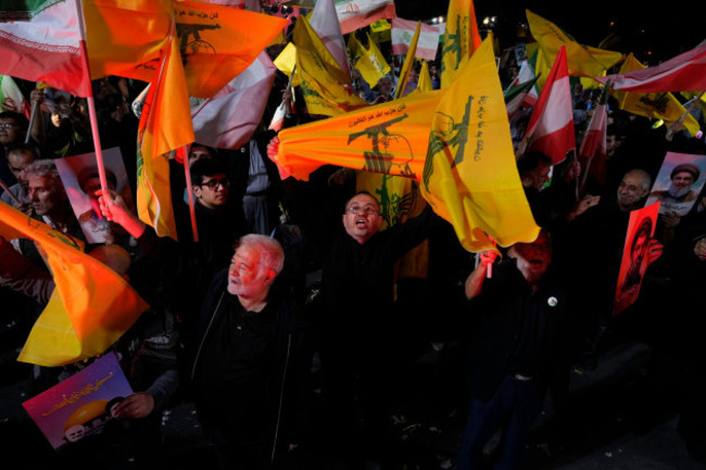 demonstrators-wave-hezbollah-flags-a-they-celebrate-irans-missile-strike-against-israel-during-a-gathering-at-felestin-palestine-sq-in-tehran-iran-tuesday-oct-1-2024-ap-photovahid-salemi