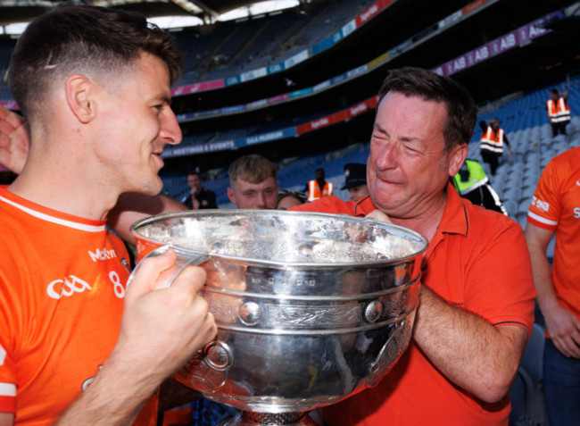 niall-grimley-receives-a-hug-from-his-father-brian-after-the-game