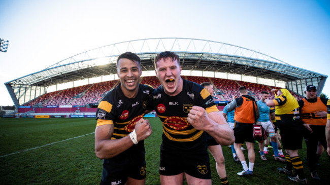 conor-phillips-celebrates-after-the-game-with-sean-rigney