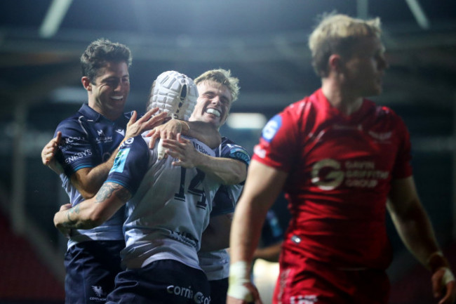 mack-hansen-celebrates-after-scoring-his-sides-second-try-with-santiago-cordero-and-ben-murphy