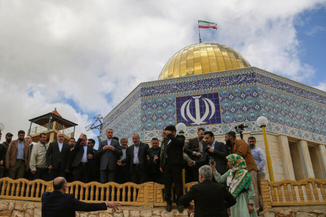 maroun-el-ras-lebanon-28th-apr-2023-iranian-foreign-minister-hossein-amir-abdollahian-flanked-by-bodyguards-and-pro-iranian-hezbollah-officials-as-they-stand-in-front-of-a-replica-of-al-aqsa-mosq