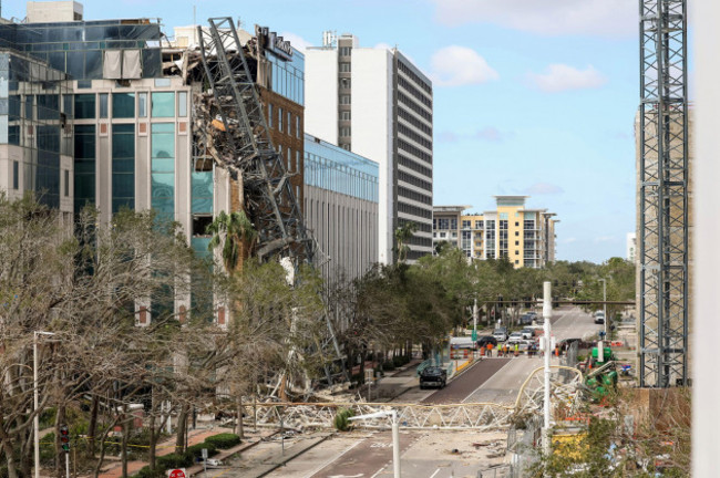 a-high-rise-construction-crane-broke-apart-and-crashed-into-the-building-across-the-street-during-hurricane-milton-on-thursday-oct-10-2024-in-st-petersburg-fla-ap-photomike-carlson