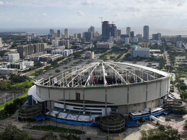 an-aerial-drone-view-of-tropicana-field-with-the-roof-shredded-after-hurricane-milton-with-downtown-st-petersburg-in-the-background-on-thursday-morning-oct-10-2024-dirk-shaddtampa-bay-times-via