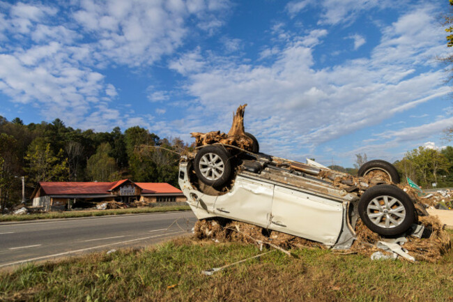 burnsville-north-carolina-october-4-a-vehicle-stands-damaged-in-the-aftermath-of-hurricane-helene-on-october-4-2024-in-burnsville-north-carolina-the-category-4-hurricane-which-made-landfall-on