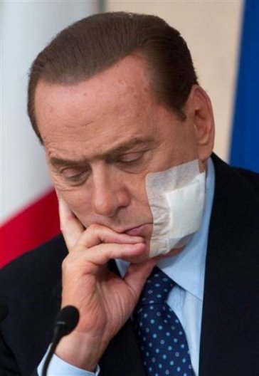 55 pictures of Silvio Berlusconi looking sad, glum, or generally displeased