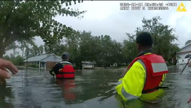 this-image-taken-from-deland-police-bodycam-shows-deland-police-and-fire-crews-conduct-water-rescues-after-hurricane-milton-on-thursday-oct-10-2024-in-deland-fla-city-of-deland-fla-via-ap