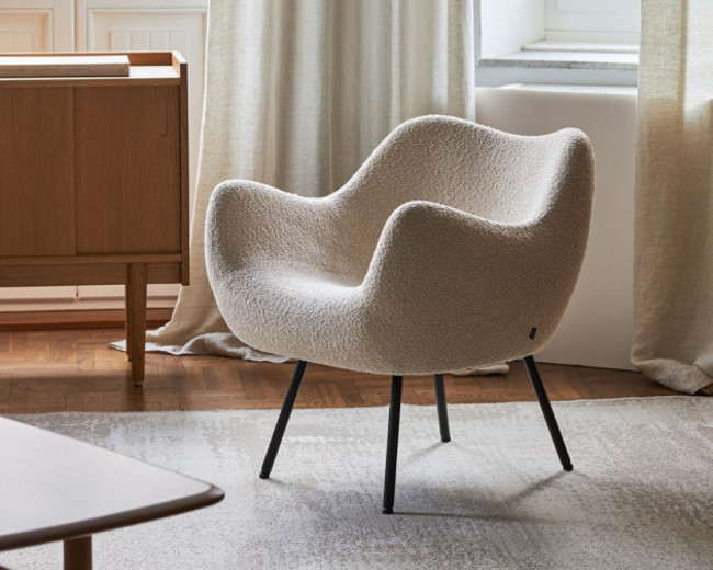 2. The Tactile Home. A boucle chair from a selection at April and the Bear.