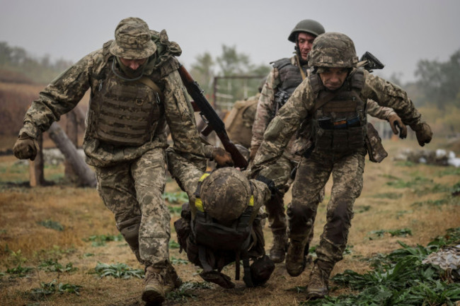 in-this-photo-provided-by-the-24th-mechanised-brigade-press-service-ukrainian-newly-recruited-servicemen-improve-their-tactical-skills-on-obstacle-course-at-the-training-field-in-donetsk-region-ukra