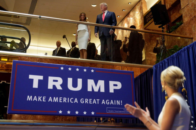 file-in-this-sunday-june-16-2015-file-photo-donald-trump-accompanied-by-his-wife-melania-trump-is-applauded-by-his-daughter-ivanka-trump-right-as-hes-introduced-before-his-announcement-that