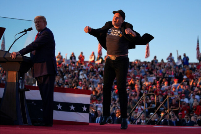 file-elon-musk-jumps-on-the-stage-as-republican-presidential-nominee-former-president-donald-trump-speaks-at-a-campaign-rally-at-the-butler-farm-show-saturday-oct-5-2024-in-butler-pa-ap-phot