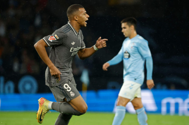 real-madrids-kylian-mbappe-celebrates-after-scoring-the-opening-goal-during-a-spanish-la-liga-soccer-match-between-celta-and-real-madrid-at-the-balaidos-stadium-in-vigo-spain-saturday-oct-19-20