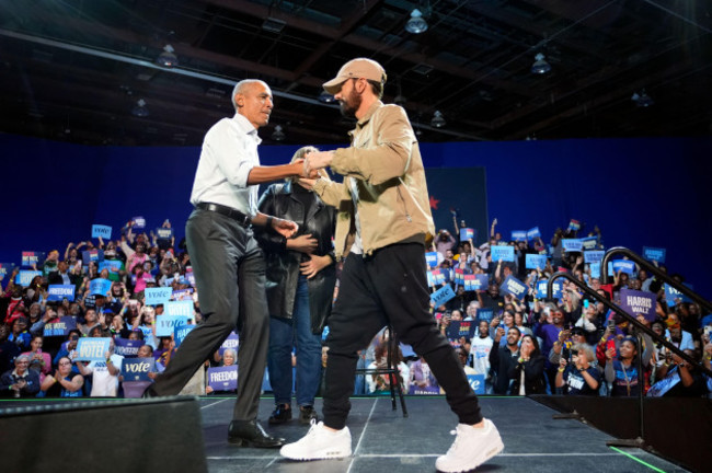 rapper-eminem-right-greets-former-president-barack-obama-left-on-stage-at-a-campaign-rally-supporting-democratic-presidential-nominee-vice-president-kamala-harris-tuesday-oct-22-2024-in-detro