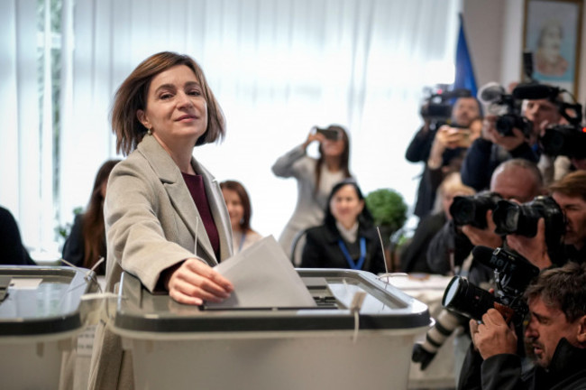 moldovas-president-maia-sandu-prepares-to-cast-her-vote-in-chisinau-moldova-sunday-oct-20-2024-during-a-presidential-election-and-a-referendum-on-whether-to-enshrine-in-the-constitution-the-co