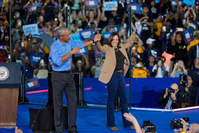 former-president-barack-obama-gestures-to-democratic-presidential-nominee-vice-president-kamala-harris-after-introducing-her-to-speak-during-a-campaign-rally-for-harris-on-thursday-oct-24-2024-in