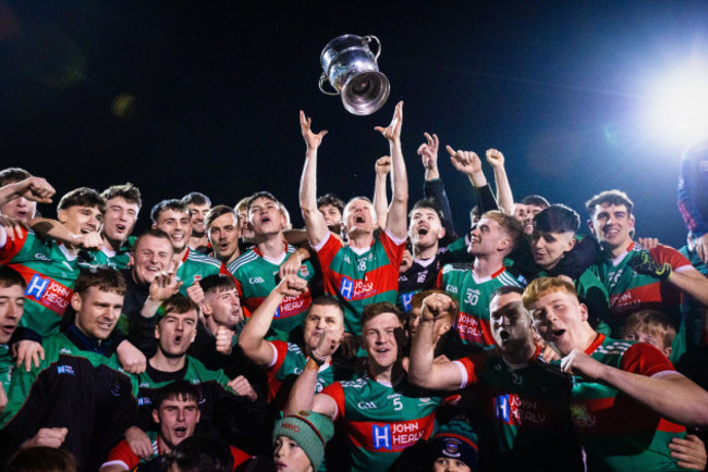 stephen-mullins-lifts-the-paddy-moclair-cup-as-his-team-celebrates-winning