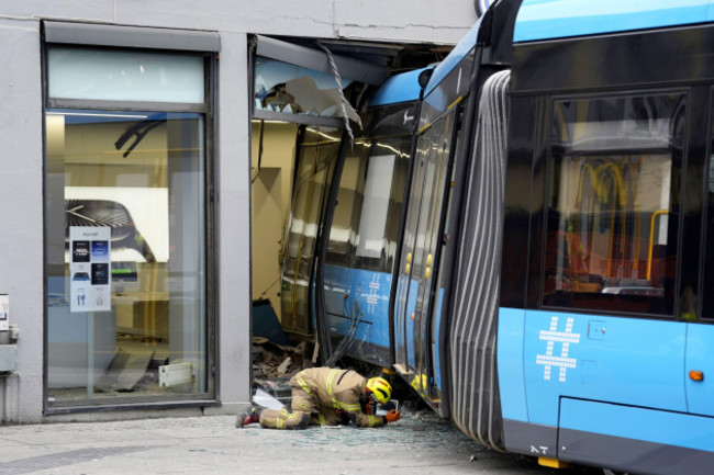 a-derailed-tram-that-crashed-into-a-building-in-downtown-oslo-norway-tuesday-oct-29-2024-terje-pedersenntb-scanpix-via-ap