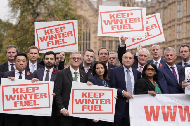 conservative-mps-petition-the-government-to-stop-the-planned-cuts-to-the-winter-fuel-payment-on-college-green-in-westminster-london-picture-date-tuesday-october-29-2024