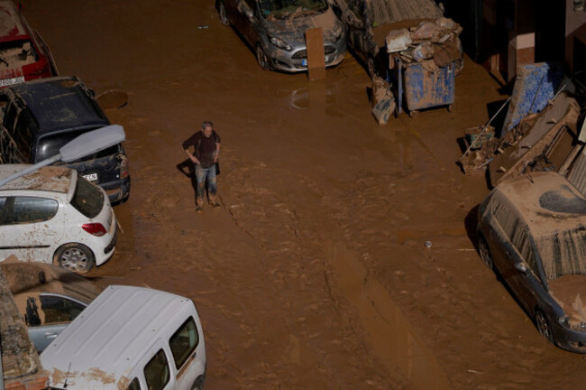 a-man-stands-next-to-houses-affected-by-floods-in-valencia-spain-thursday-oct-31-2024-ap-photoalberto-saiz