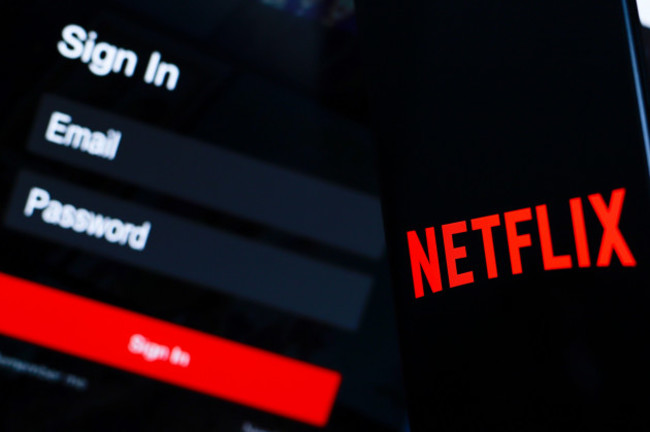 july-14-2024-paraguay-in-this-photo-illustration-the-netflix-logo-is-displayed-on-a-smartphone-screen-next-to-a-login-screen-with-email-passwor