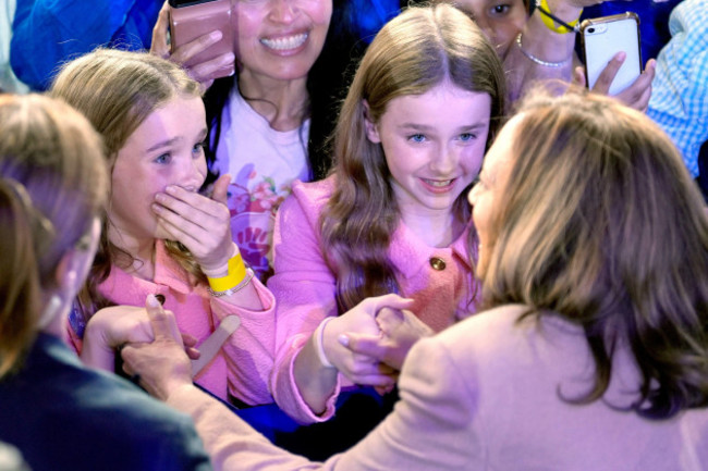 democratic-presidential-nominee-vice-president-kamala-harris-bottom-right-greets-young-supporters-after-speaking-during-a-campaign-rally-saturday-nov-2-2024-at-the-pnc-music-pavilion-in-charlot