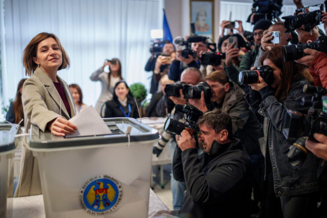 moldovas-president-maia-sandu-prepares-to-cast-her-vote-in-chisinau-moldova-sunday-oct-20-2024-during-a-presidential-election-and-a-referendum-on-whether-to-enshrine-in-the-constitution-the-co