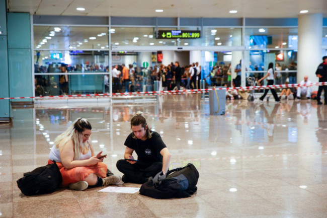 tapes-to-separate-the-section-where-water-has-fallen-due-to-rains-at-barcelona-el-prat-airport-on-november-4-2024-in-el-prat-de-llobregat-barcelona-catalonia-spain-the-airport-has-diverted-12