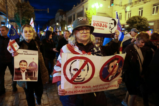 protesters-take-part-in-a-rally-against-alleged-violations-in-a-recent-parliamentary-election-in-tbilisi-georgia-monday-nov-4-2024-ap-photozurab-tsertsvadze