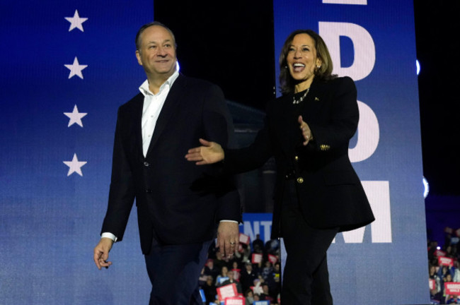 democratic-presidential-nominee-vice-president-kamala-harris-right-and-second-gentleman-doug-emhoff-depart-at-the-conclusion-of-a-campaign-rally-outside-the-philadelphia-museum-of-art-monday-nov