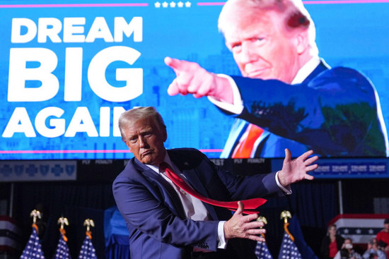 republican-presidential-nominee-former-president-donald-trump-gestures-at-a-campaign-rally-at-van-andel-arena-tuesday-nov-5-2024-in-grand-rapids-mich-ap-photoevan-vucci