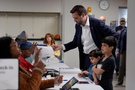 republican-vice-presidential-nominee-sen-jd-vance-r-ohio-and-children-arrives-to-vote-at-the-st-anthony-of-padua-maronite-catholic-church-on-election-day-tuesday-nov-5-2024-in-cincinnati-ap