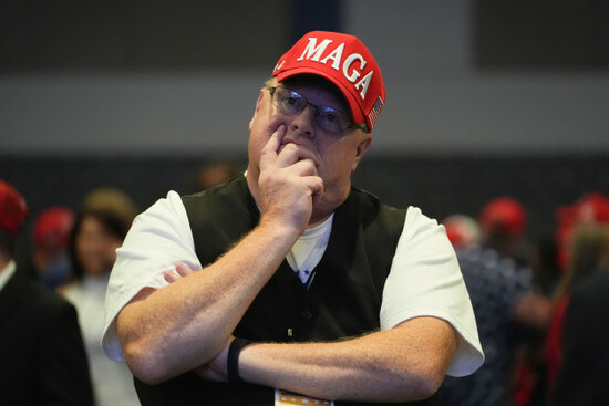 fred-becker-of-saint-cloud-fla-watches-returns-as-he-attends-a-watch-party-for-republican-presidential-nominee-former-president-donald-trump-at-the-palm-beach-county-convention-center-during-an-ele