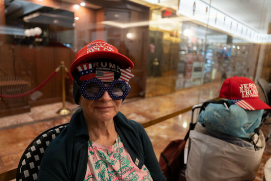 new-york-usa-05th-nov-2024-a-woman-wearing-a-hat-saying-iom-voting-for-a-convicted-felon-and-otrump-make-america-great-againo-glasses-in-the-cafe-in-trump-tower-election-day-new-york-usa-5-n