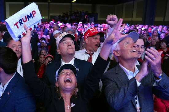 supporters-watch-returns-at-a-campaign-election-night-watch-party-for-republican-presidential-nominee-former-president-donald-trump-at-the-palm-beach-convention-center-wednesday-nov-6-2024-in-wes